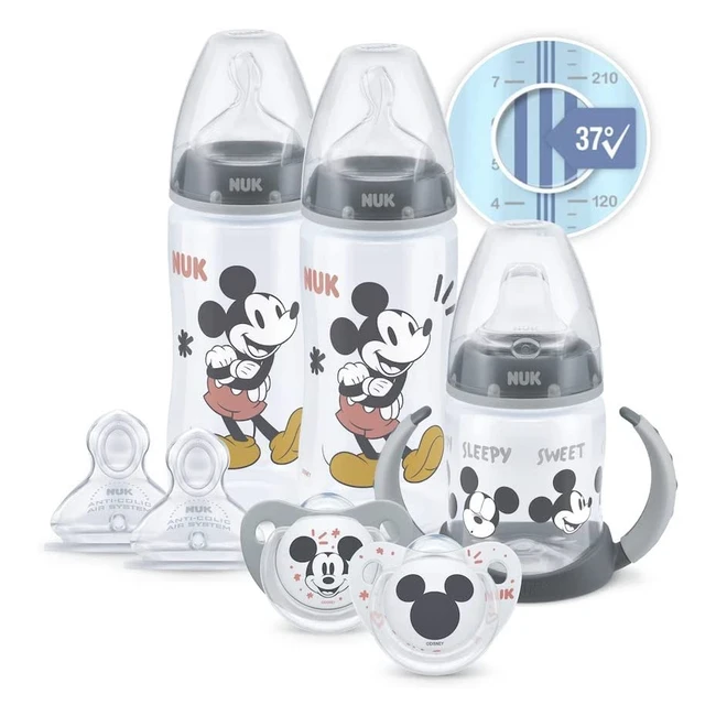 NUK Disney First Choice Set - Temperature Control, Orthodontic Teats, Learner Cup, Soothers, Anti-colic Vent, BPA-Free - Mickey Mouse